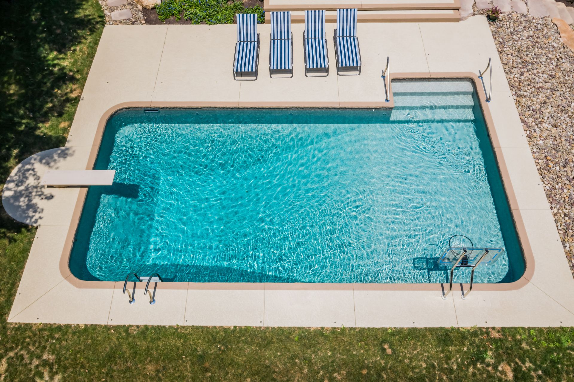 An inground vinyl liner pool that can be heated to extend your swim season.